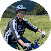 Headshot distance Sandra Davis Sandra Davis on a mountain bike in the sun
