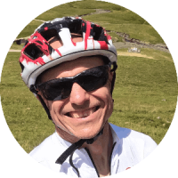 Mike Davis headshot Sunny headshot of Mike Davis wearing bike helmet