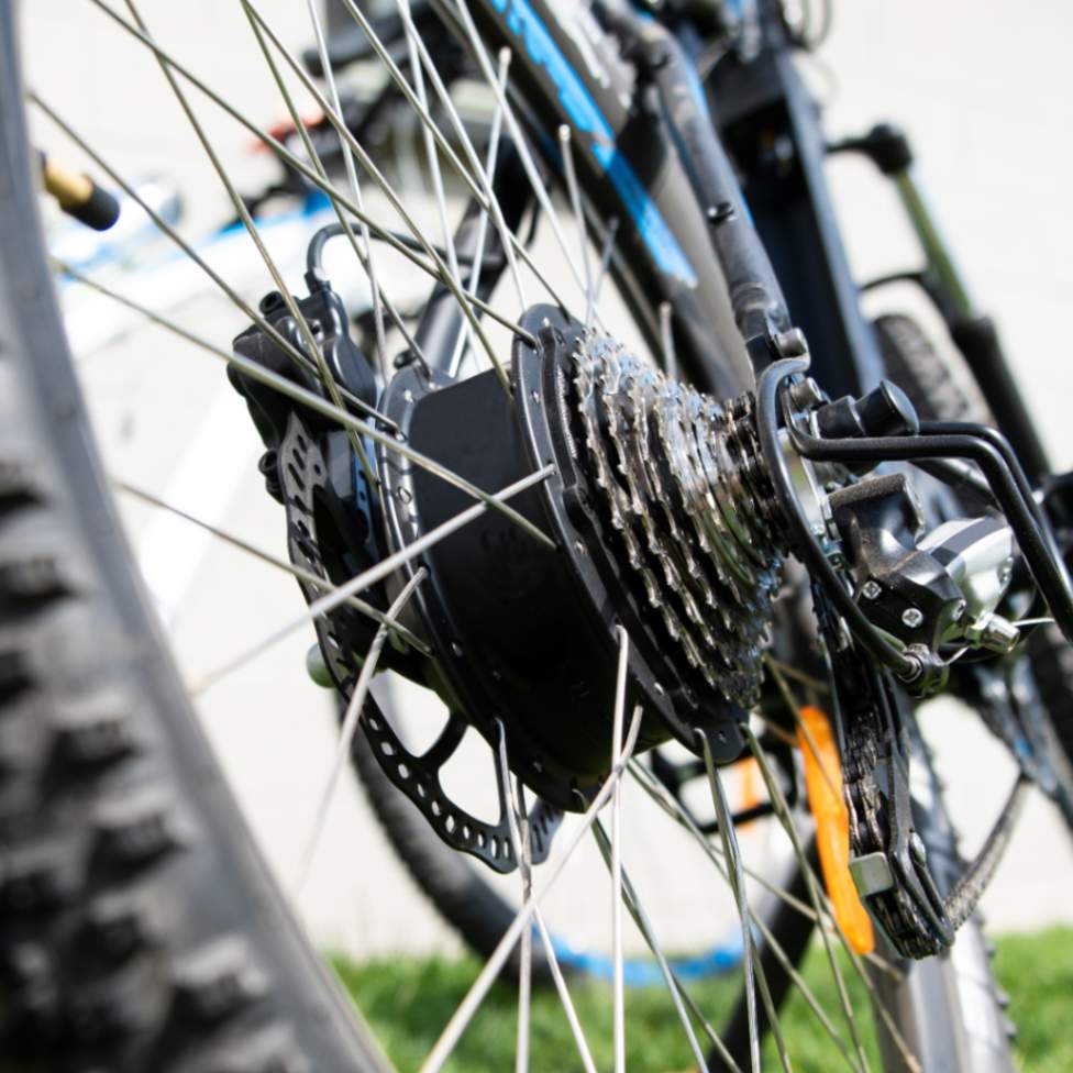 E-bike rear wheel showing rear hub motor and sprockets