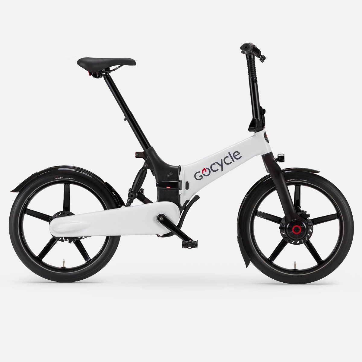 White sturdy folding e-bike with small black wheels with five spokes each, plus mudguards