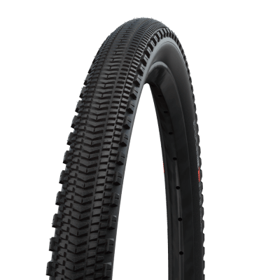Close-up of a black gravel bike tyre in a studio